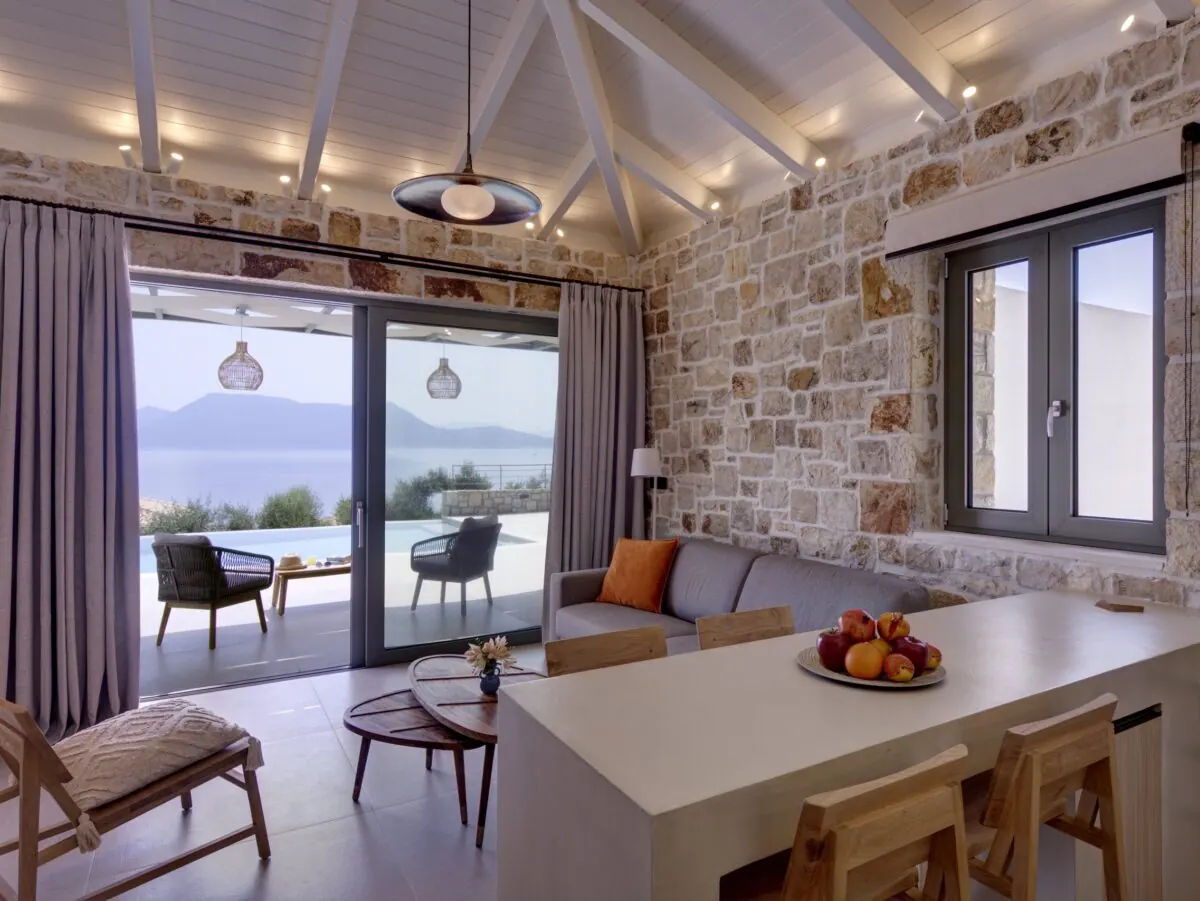 Living room at Astir opening to the pool terrace